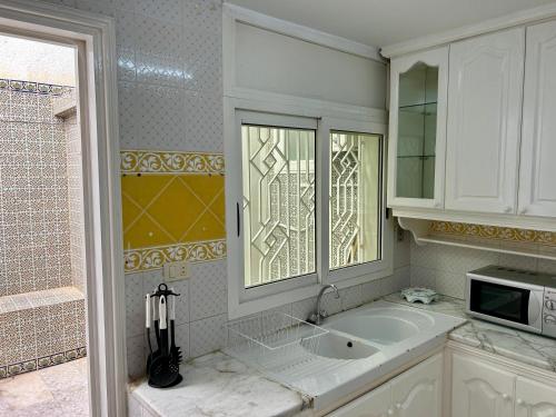 Kuchyň nebo kuchyňský kout v ubytování Ines House