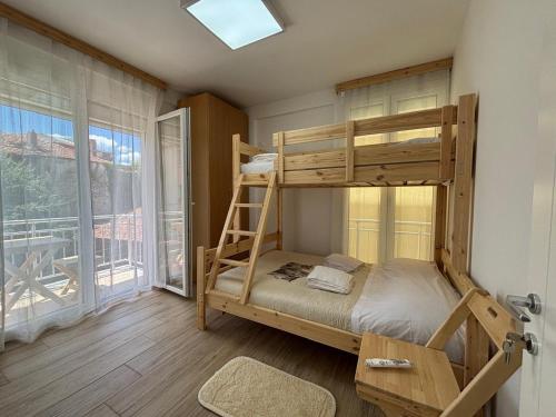 Ένα ή περισσότερα κρεβάτια σε δωμάτιο στο Kilometer 0 Comfortable Appartment