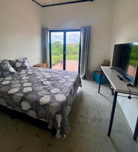 Postel nebo postele na pokoji v ubytování Monte Adentro