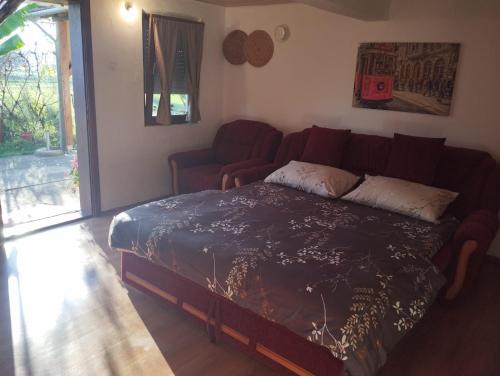 Ένα ή περισσότερα κρεβάτια σε δωμάτιο στο Blossom Cottage - ''Green Energy''