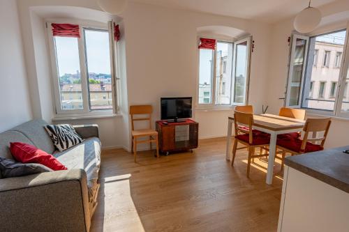 TV a/nebo společenská místnost v ubytování Casa Lumière