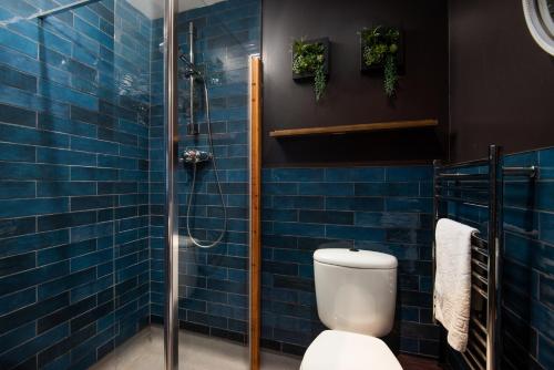 Ένα μπάνιο στο Wonderland Berwick 5-bedrooms Pet-friendly cottage with the Hot tub