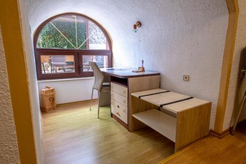 an office with a desk and a window in a room at Villa Sea Valley in Crikvenica