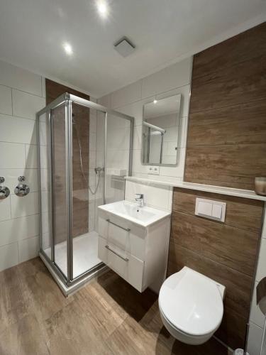 Ένα μπάνιο στο Ferienwohnung Eider