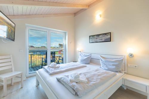 Ένα ή περισσότερα κρεβάτια σε δωμάτιο στο Krabbenfischer