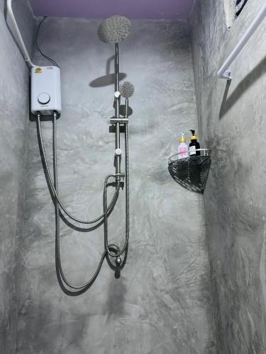 a shower in a bathroom with a shower at Serenity House 4A in Ban Ko Khwan