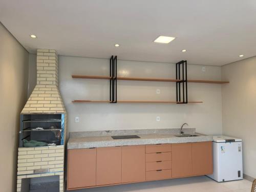 Kuchyň nebo kuchyňský kout v ubytování Residencial Praia dos Corais