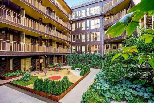 Zahrada ubytování Cozy and modern apartment in the heart of OSLO