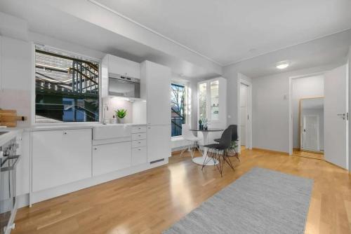Posezení v ubytování Cozy and modern apartment in the heart of OSLO