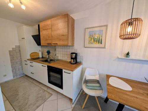 Kuchyň nebo kuchyňský kout v ubytování Appartement Mettenberg