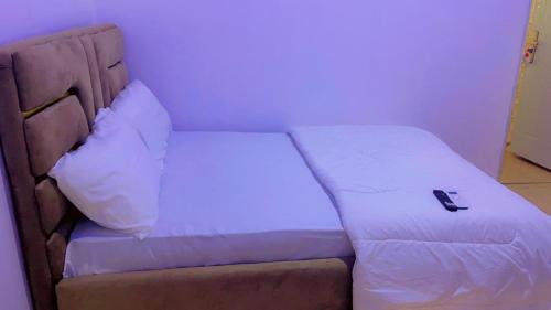 Ένα ή περισσότερα κρεβάτια σε δωμάτιο στο Platinum Mini flat