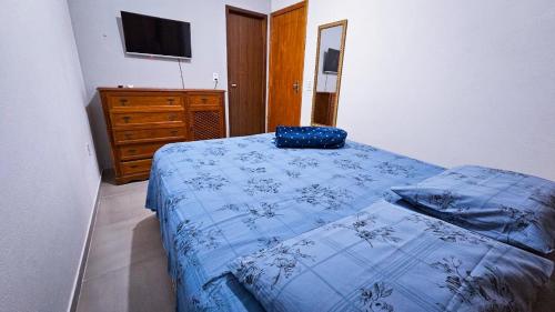 Postel nebo postele na pokoji v ubytování Aconchego na Chapada