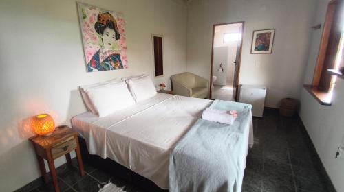 En eller flere senge i et værelse på Pousada Casa Franco - Trancoso