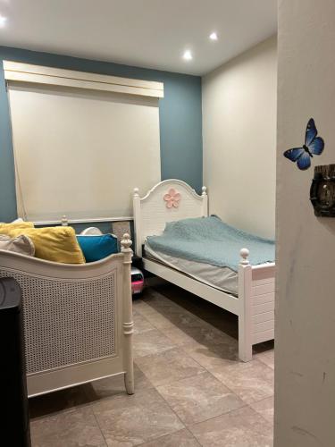 Voodi või voodid majutusasutuse Villa Catali toas