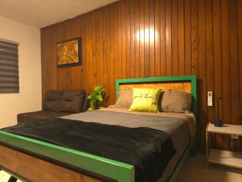 Postel nebo postele na pokoji v ubytování OLYMPIA SUITES sleep local habitaciones ejecutivas