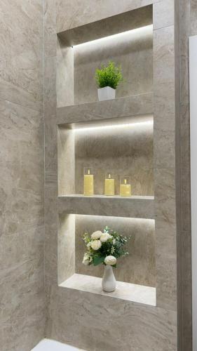 Φωτογραφία από το άλμπουμ του Квартира на левом берегу в ЖК Alpamys A4 σε Astana