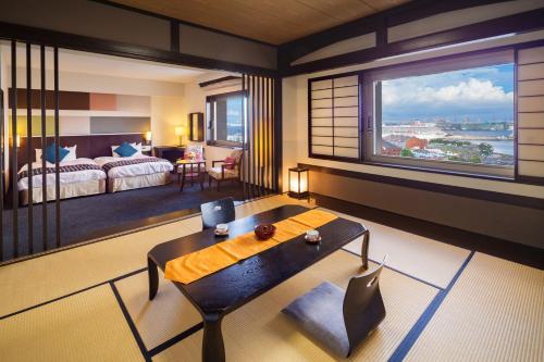 Postel nebo postele na pokoji v ubytování Navios Yokohama