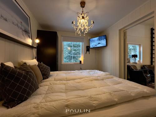 Postel nebo postele na pokoji v ubytování Lindvallen Ski Resort - Sauna - 4 Guests