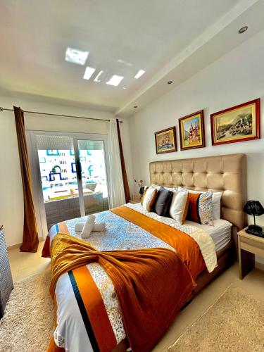 Voodi või voodid majutusasutuse Appartement 2 chambres, près de la mer, résidence calme toas