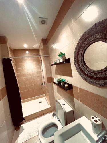 Vannituba majutusasutuses Appartement 2 chambres, près de la mer, résidence calme