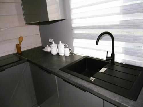 Kuchyň nebo kuchyňský kout v ubytování Terraced House near Baltic Sea and Golf Course