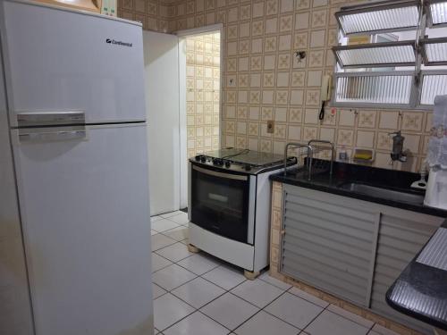 Køkken eller tekøkken på Espaço Praia do Morro