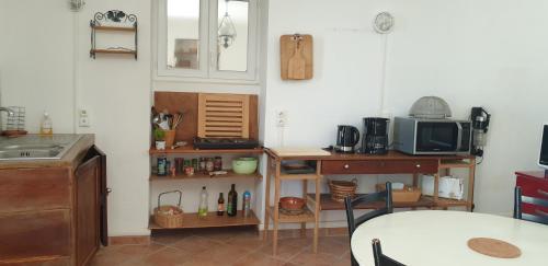 Kuchyň nebo kuchyňský kout v ubytování Maison de charme avec Terrasse vue sur mer