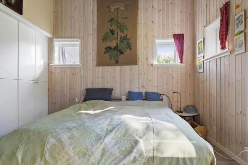 Ένα ή περισσότερα κρεβάτια σε δωμάτιο στο 20513-Samso-Strandlykken-3