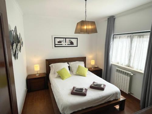 Ένα ή περισσότερα κρεβάτια σε δωμάτιο στο L'Escale au Portugal Villa-B&B-Spa