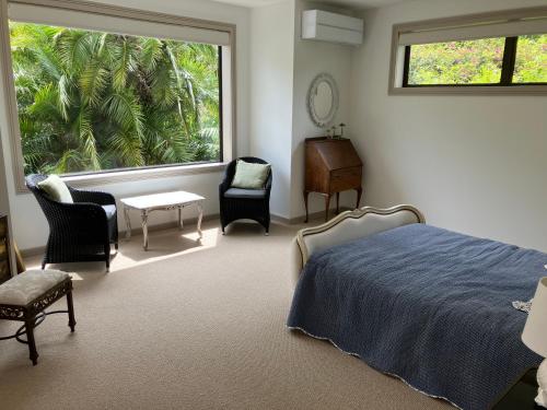 Ένα ή περισσότερα κρεβάτια σε δωμάτιο στο Waterfront Escape 5 Star Accommodation