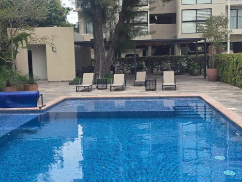 Piscina en o cerca de Departamento con alberca