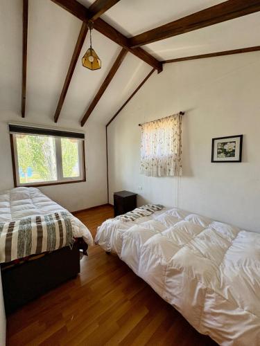 Postel nebo postele na pokoji v ubytování El Estero