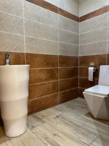 Koupelna v ubytování Yussals Luxury Apartment