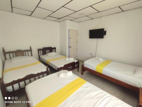 Ένα ή περισσότερα κρεβάτια σε δωμάτιο στο Hotel casa jeniferspa