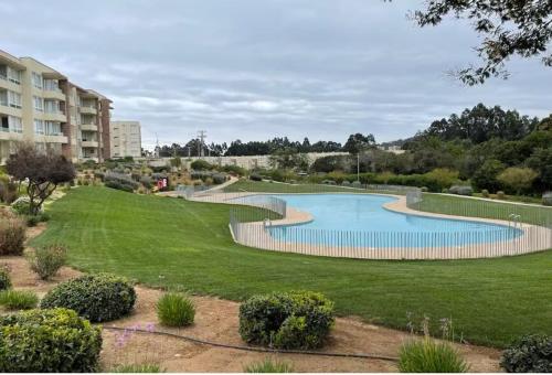 Bazén v ubytování Agradable departamento en Papudo nebo v jeho okolí