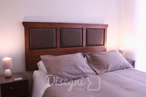 Postel nebo postele na pokoji v ubytování Disegni 04 - Departamento 2 habitaciones Copiapó, Avenida Francisco de Aguirre