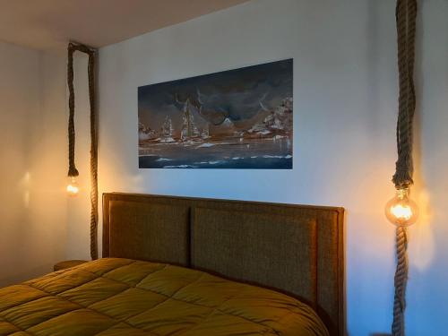 Ein Bett oder Betten in einem Zimmer der Unterkunft Dimidia - casa vacanze mare montagna