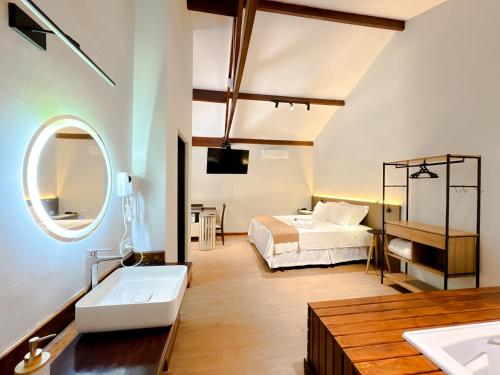 Postel nebo postele na pokoji v ubytování Pousada Flor de Ipe