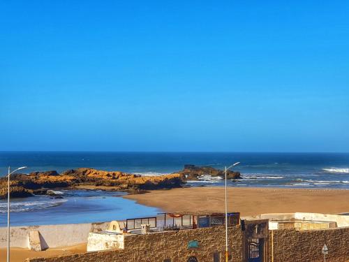 a view of a beach and the ocean at Ocean Hideaway - Sea View in Essaouira