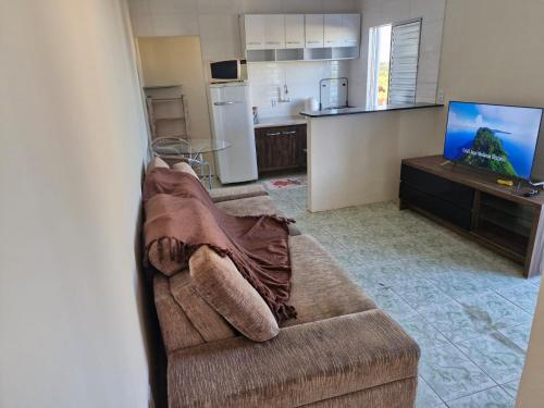 TV a/nebo společenská místnost v ubytování Condomínio Renascer