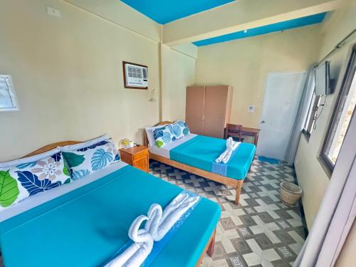 Postel nebo postele na pokoji v ubytování Mariner's Pension House