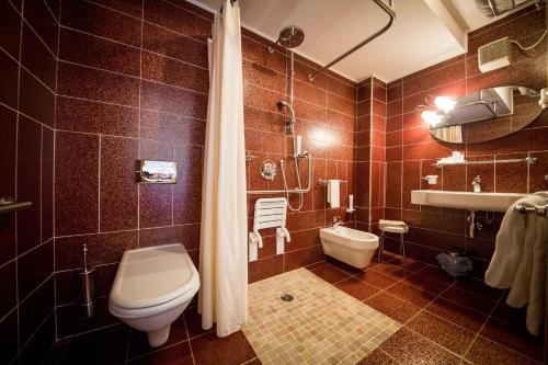 Un baño de Hotel Spessotto