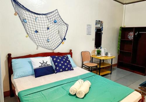 Φωτογραφία από το άλμπουμ του Bantayan Paw and Palm Stays by Junmar Lodge σε Pooc