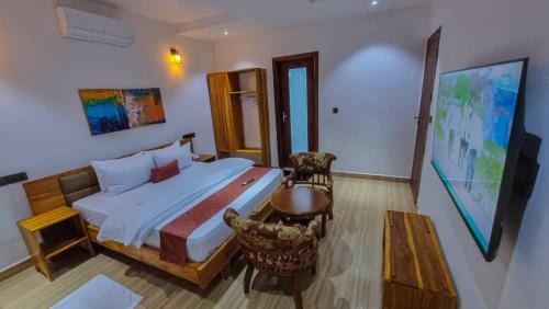 Postel nebo postele na pokoji v ubytování One pacific hotel