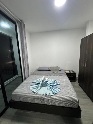 Ένα ή περισσότερα κρεβάτια σε δωμάτιο στο Hospedaje Tena Familiar