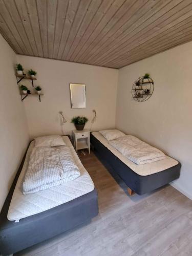 Ένα ή περισσότερα κρεβάτια σε δωμάτιο στο Lovely Holiday Home In Allinge For 6 Guests