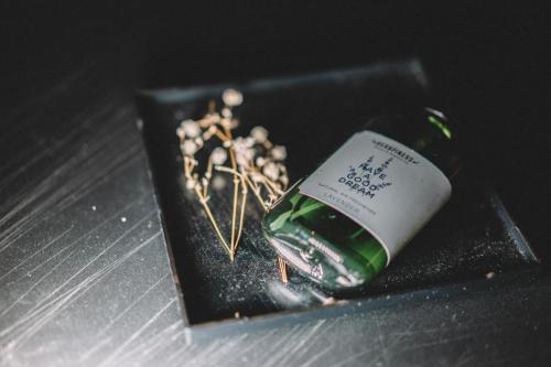 a bottle of wine sitting on top of a table at SLEEEP HKG Causeway Bay in Hong Kong