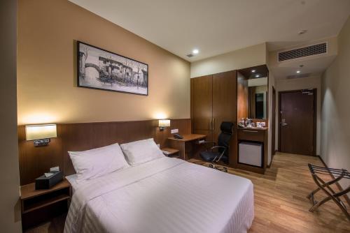 Кровать или кровати в номере Keoja Hotel