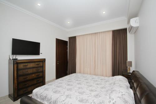 Katil atau katil-katil dalam bilik di RestCoast Villa