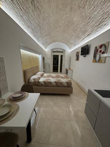 Postel nebo postele na pokoji v ubytování B&B Il Catepano